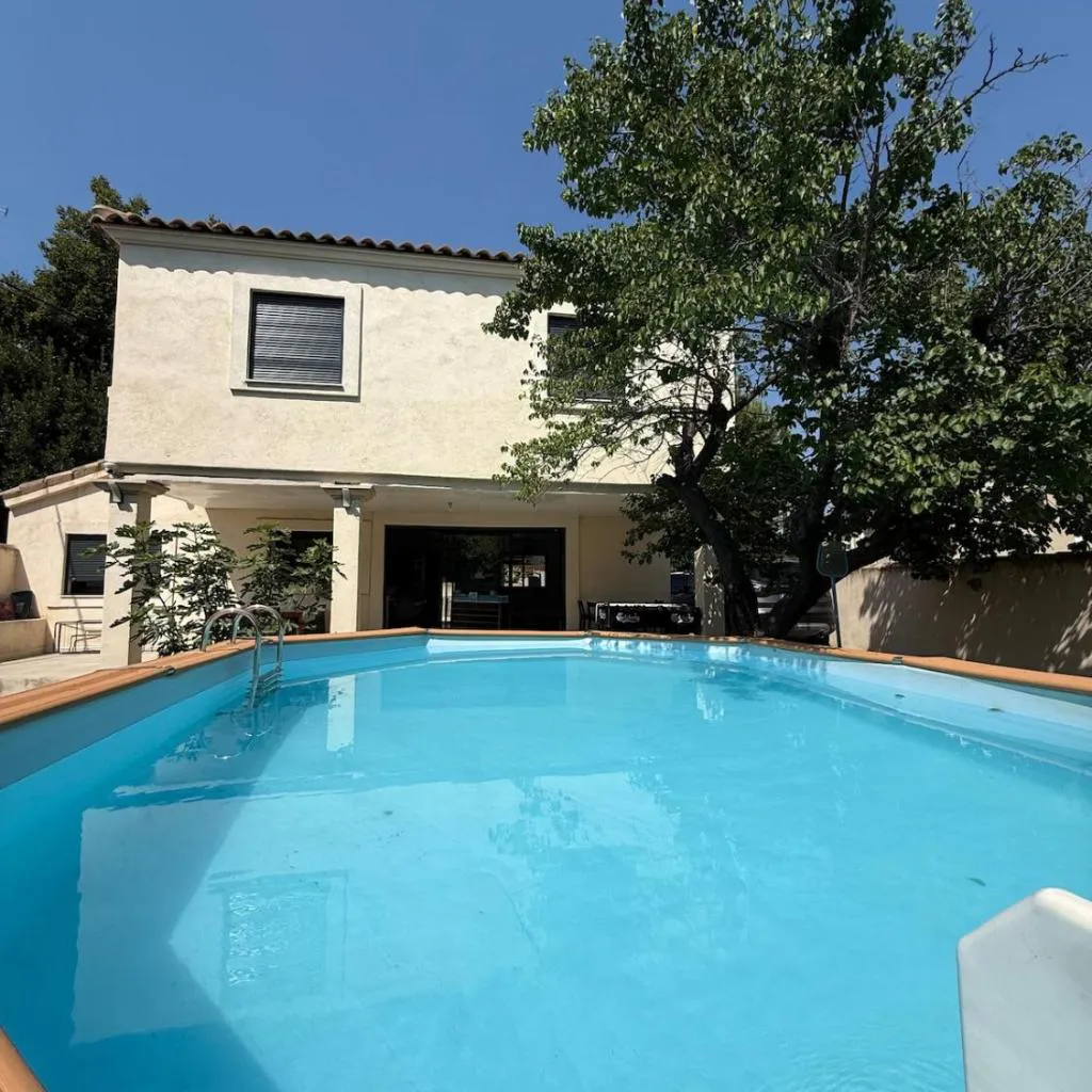 Photograph of Air-conditioned house with garden, pool & foosball table