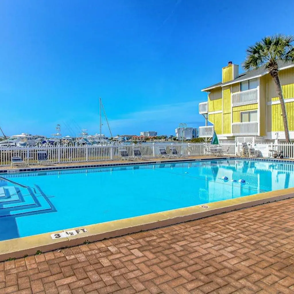 Photograph of Inviting condo with dock pool hot tub & private beach - dog-friendly