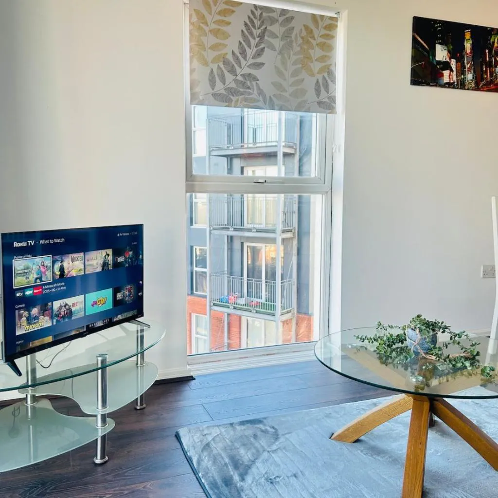 Photograph of Comfortable 2-Bedroom Flat close Etihad and Coop Live