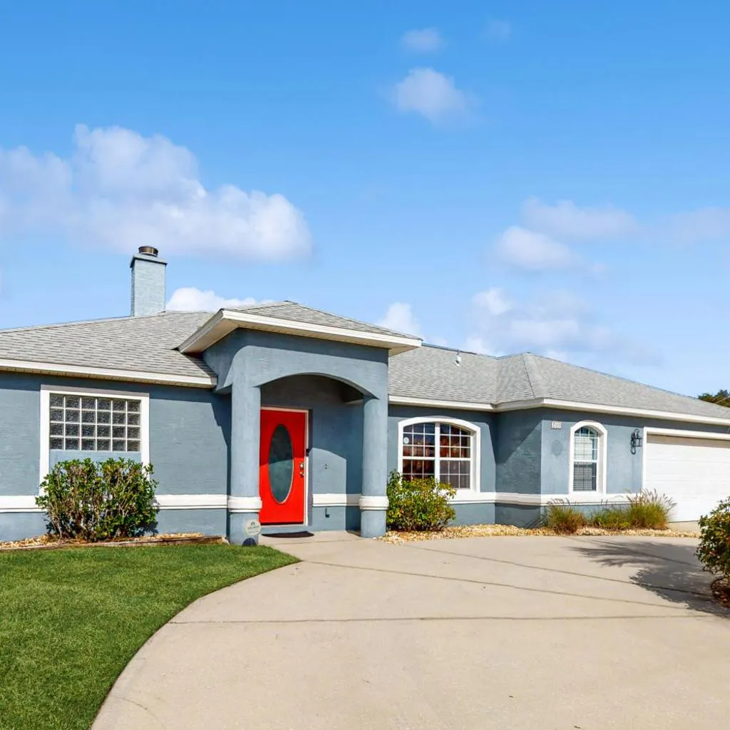 Photograph of Cheerful home with private pool close to the beach & downtown