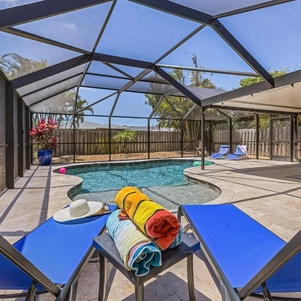 Photograph of Coastal Naples Getaway with Heated Pool