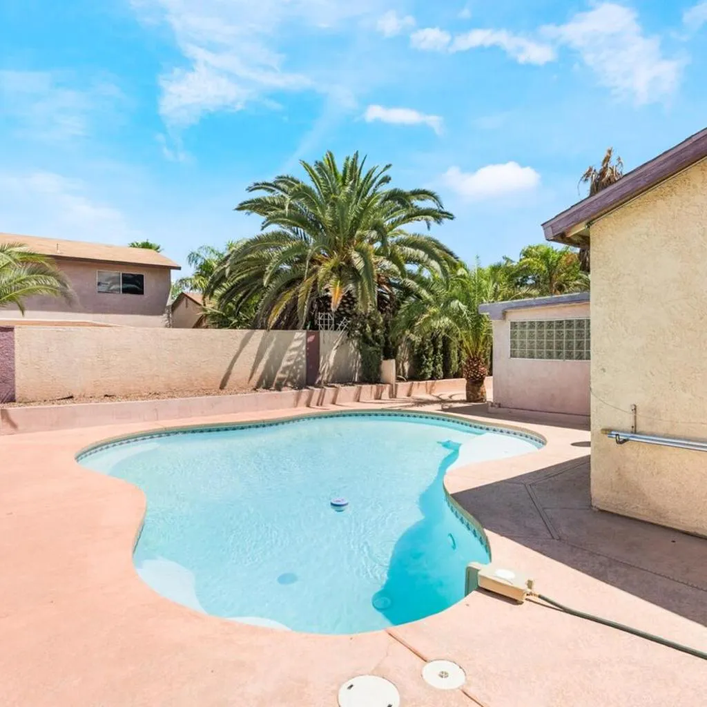 Photograph of NEW 5BR Home Pool BBQ 8 min to Strip