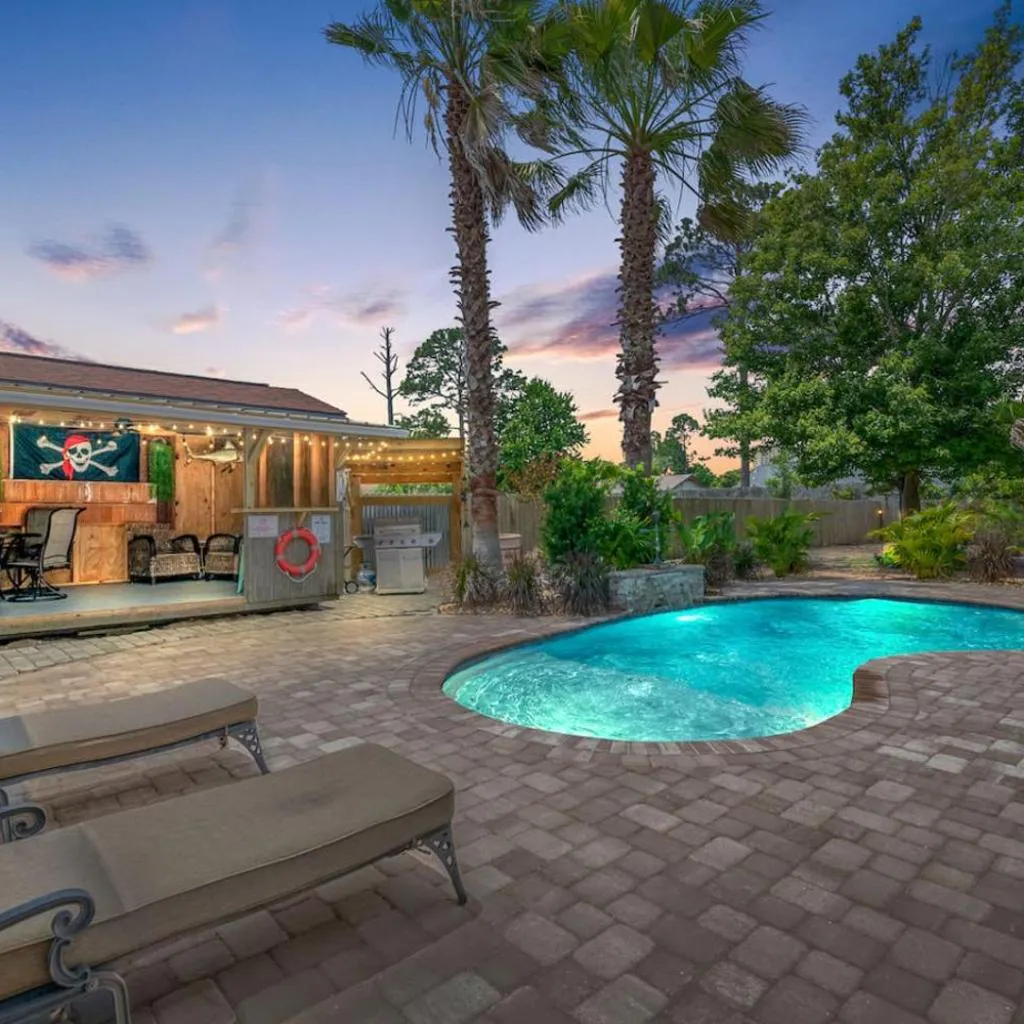 Photograph of Shipwrecked - Private Pool Home, Game Room, 5 Min to Beach, Pets OK, & More!