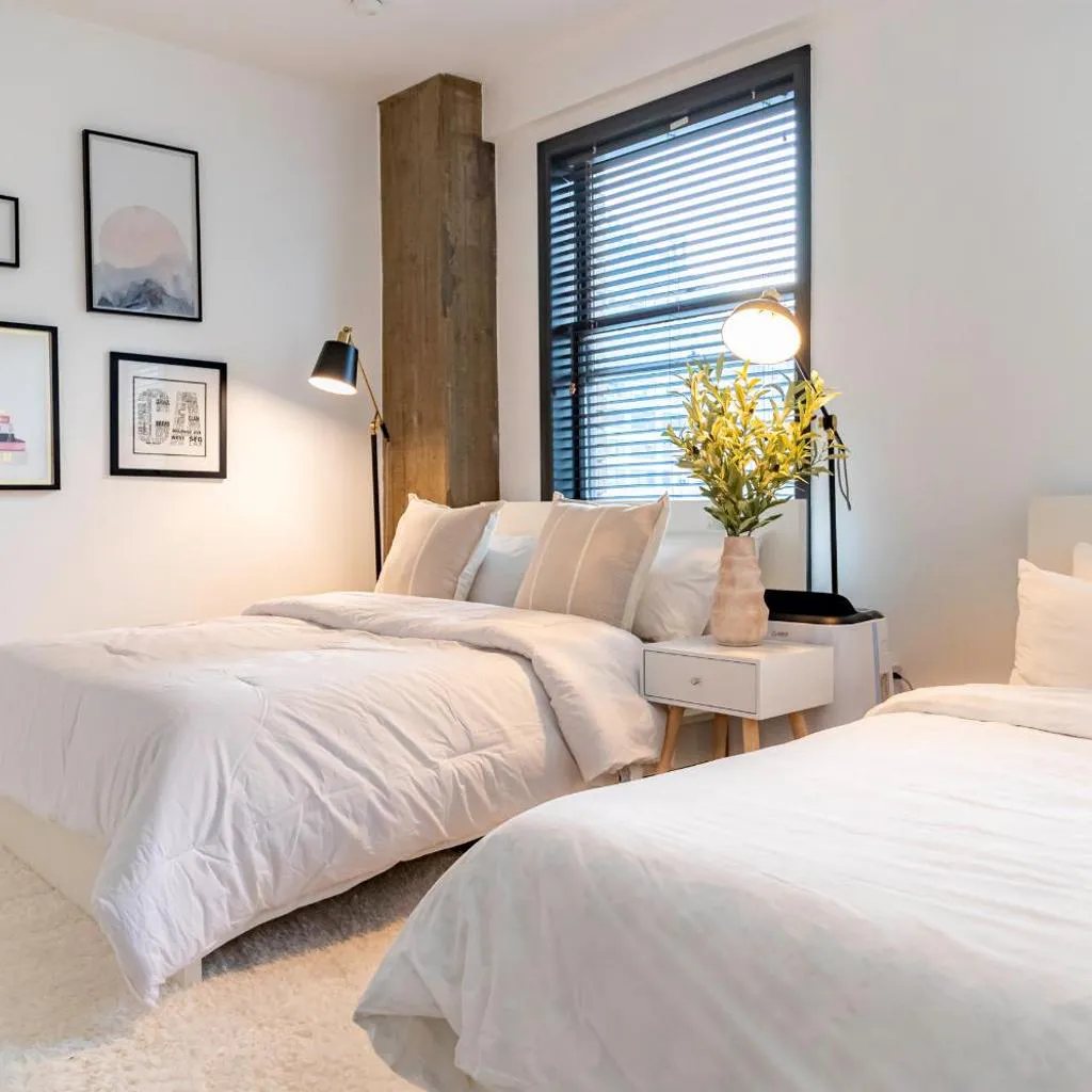 Photograph of Stylish loft 2 queens & 2 sofas