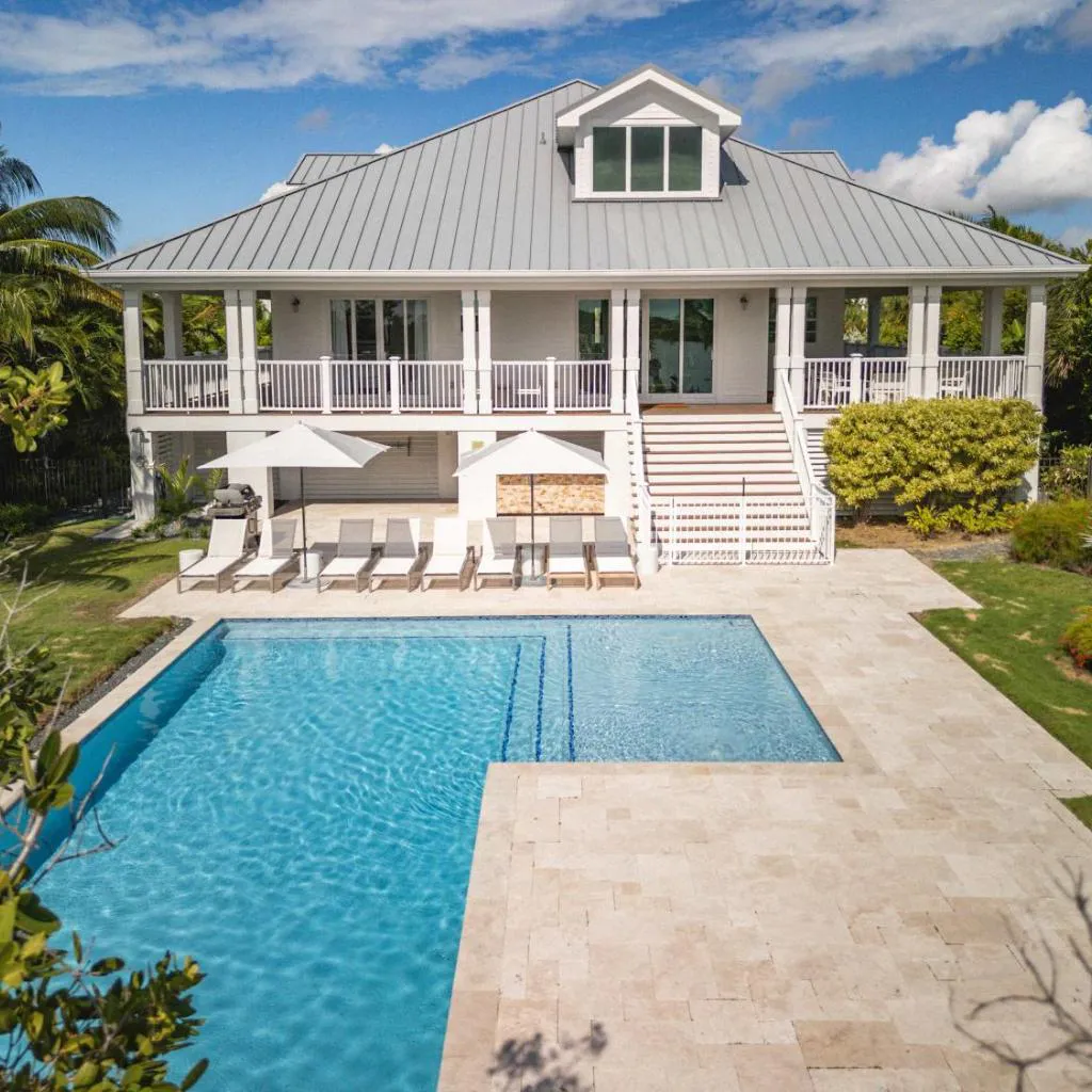 Photograph of Suncoast House -Pool & Boat Dock