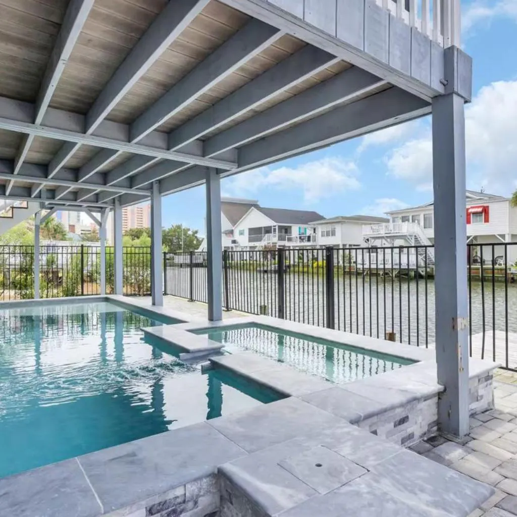 Photograph of 6BR Waterfront Home Private Pool & Dock