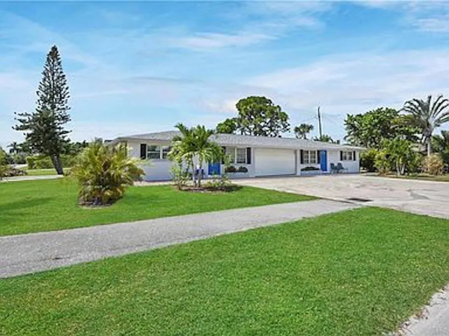 Photograph of 699 BEACH OASIS,WALK,BIKE TO BEACH, FENCED BACKYARD, Large Driveway