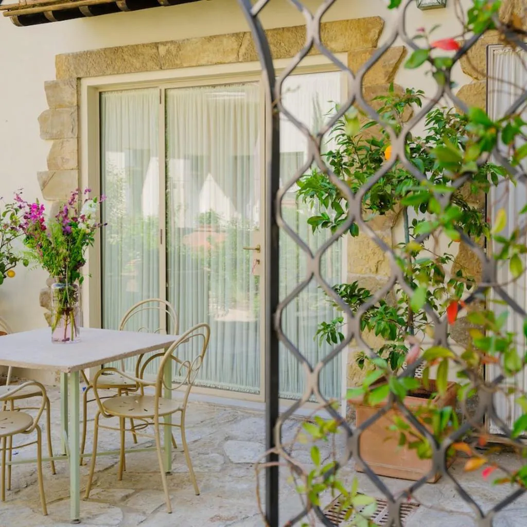 Photograph of Chicco - Modern Two-Bedroom in a Green Courtyard