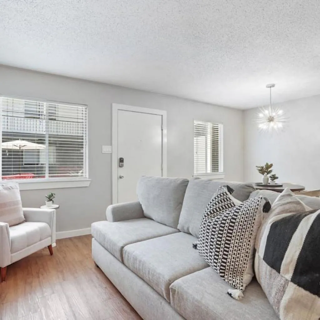 Photograph of Cook and Gather Around in a Fully Equipped Apartment
