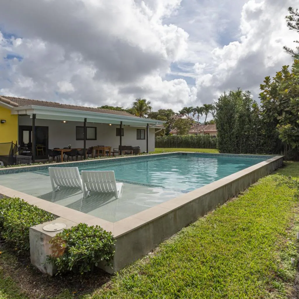 Photograph of Heated pool - 5min Coral Gables - Family Vacation