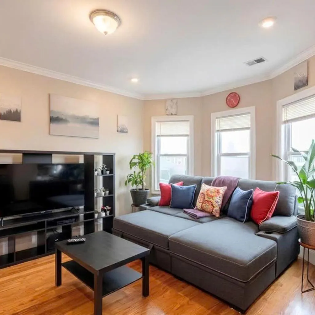 Photograph of Vibrant 4BR Boston Apt - Balcony, Bathtub, TV near I-95 & Pet Friendly 903
