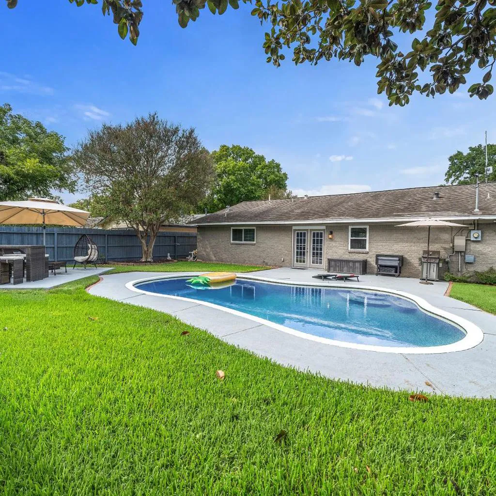 Photograph of Pool Stay Near DT, Heights WiFi Games Yard BBQ