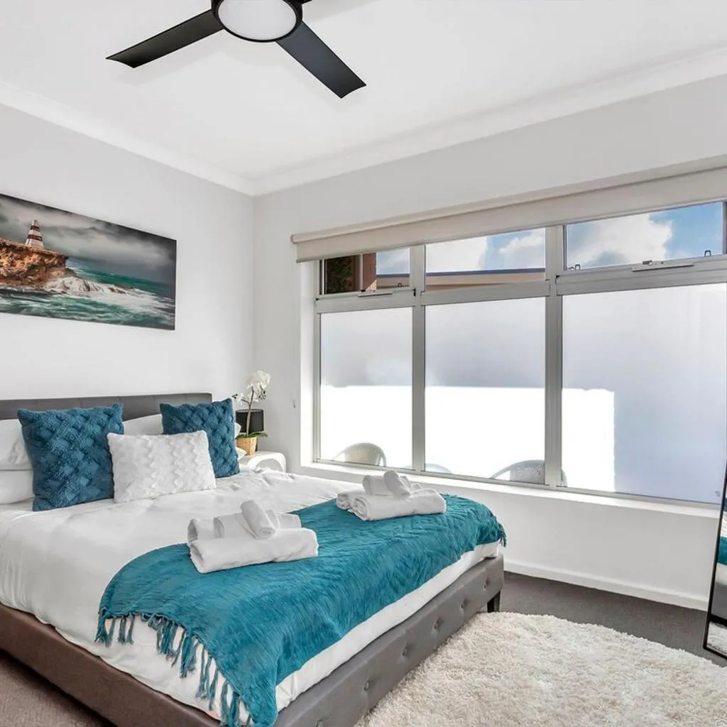 Photograph of Stylish Seaside Suite with Arcade and Balcony