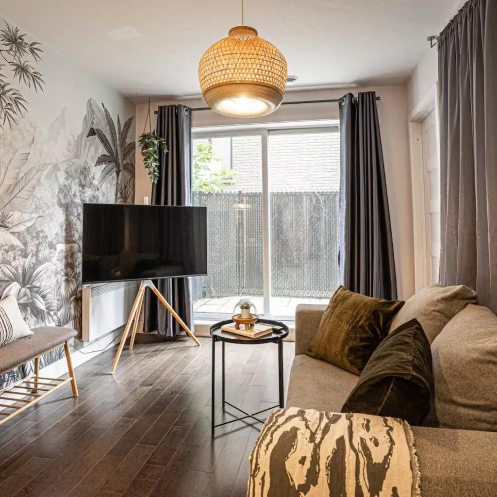 Photograph of Sleek Modern 2BR Getaway with Gym & Rooftop Views Near Downtown & Airport