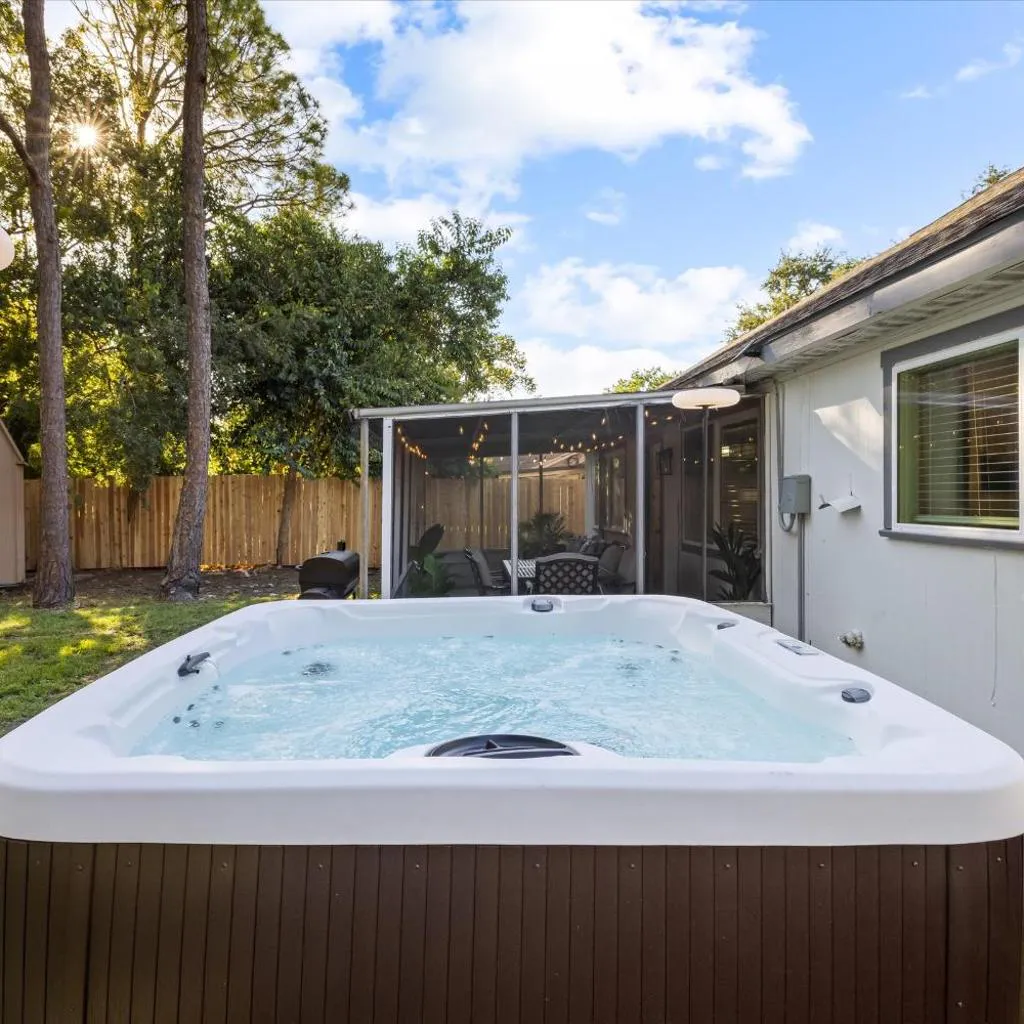 Photograph of Htown Hot Tub Getaway Swing Set BBQ Yard Games