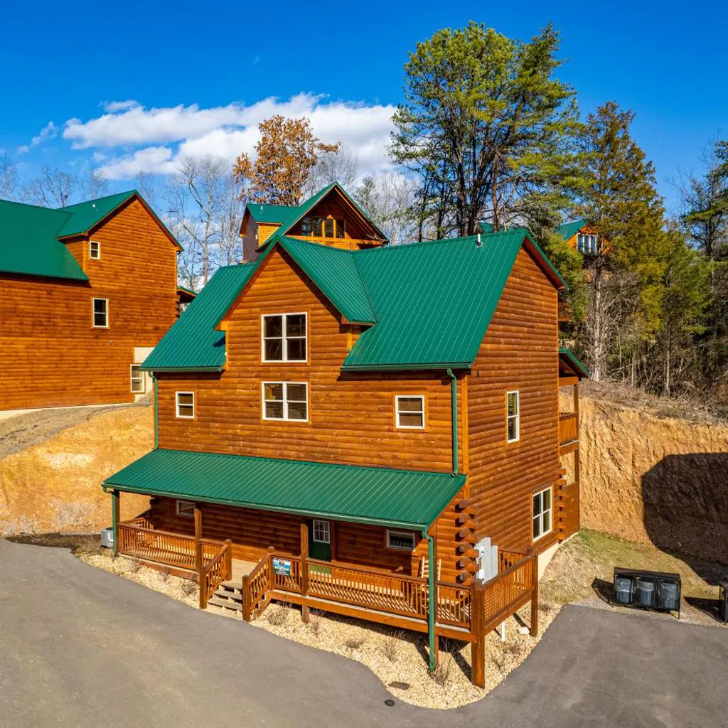 Photograph of Luxe 5BR Cabin, Hot Tub, Theater & Game Room 1mi to the Strip! 4mi to Dollywood