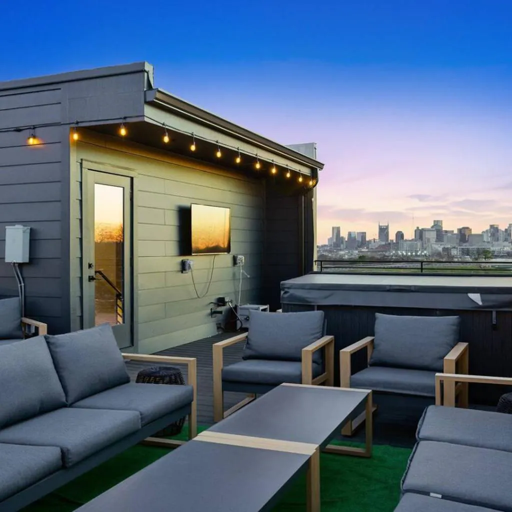 Photograph of City View Home with HotTub Rooftop Arcade Game and Parking