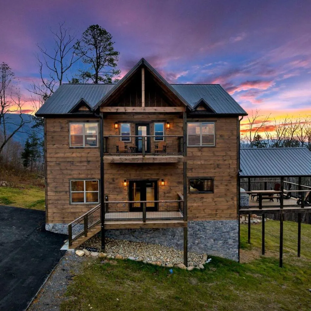 Photograph of Honeybear Hideaways - Modern Luxurious Cabin with Pool, Hot Tub, Fire Place, Game Room and Theater Room