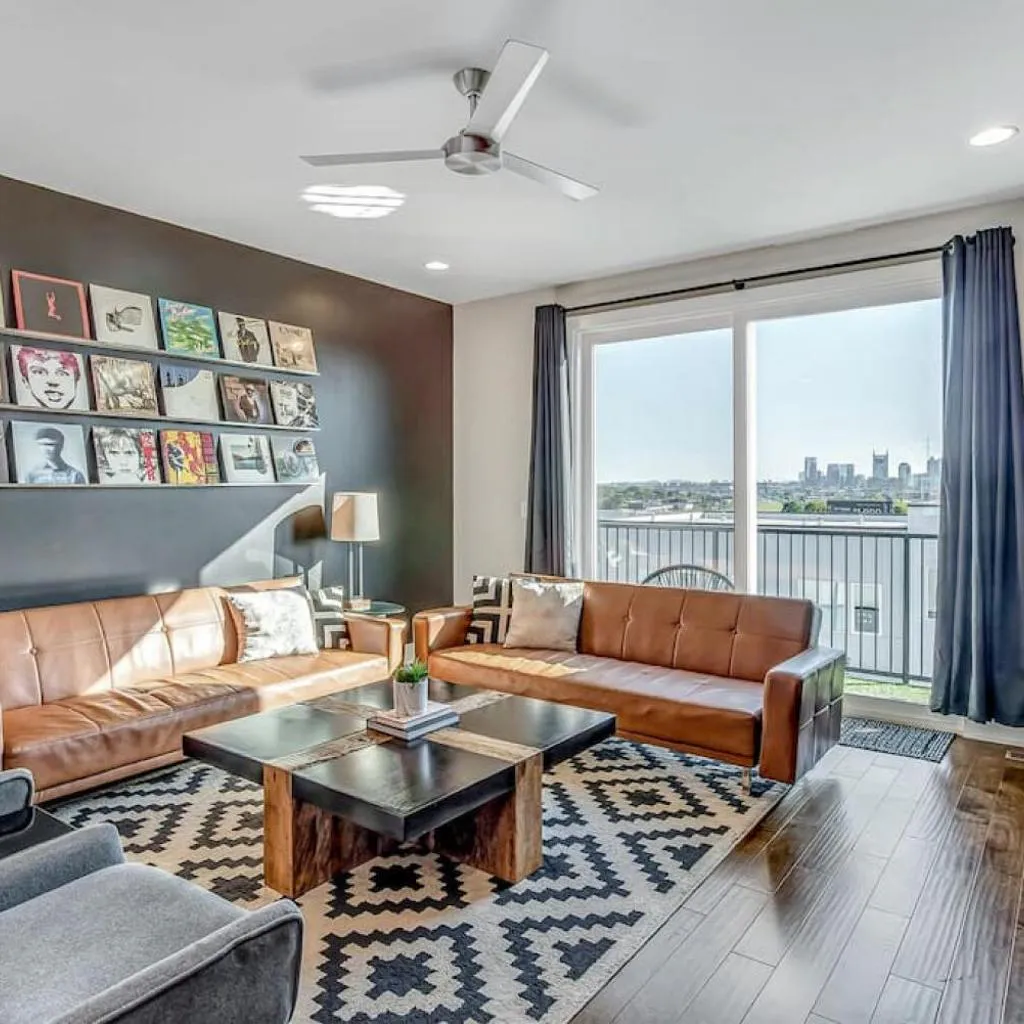 Photograph of Big NEW and Modern with Skyline View Mural and Ping Pong