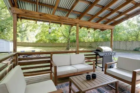 Photograph of 1-Story Home, Fenced Yard, Grill, Firepit, Parking, Sleeps 10, Pet-Friendly, Smart TVs, 10 Mins to Nissan Stadium & Five Points, Cozy Bedrooms, Outdoor Fun, Perfect for Families & Groups