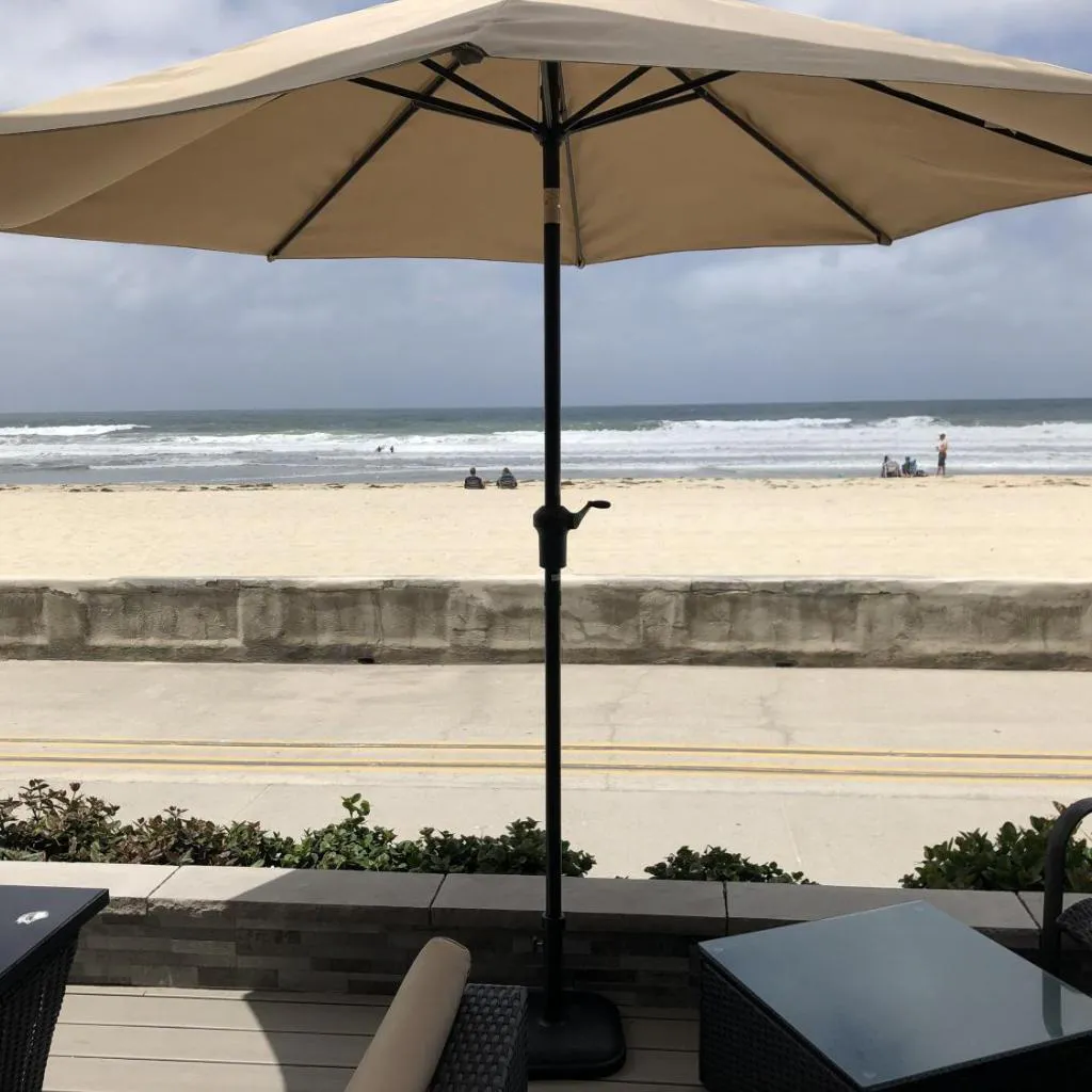 Photograph of Ocean Front On Beach! -2 Master BR, 2 Full BA, Patio!, AC, Parking, Close to All