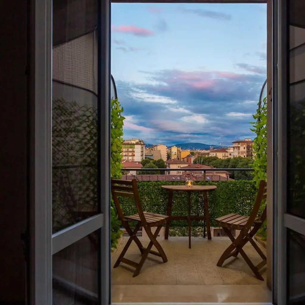 Photograph of Living Florinda Apt. (3' to Airport, 9' to Center)