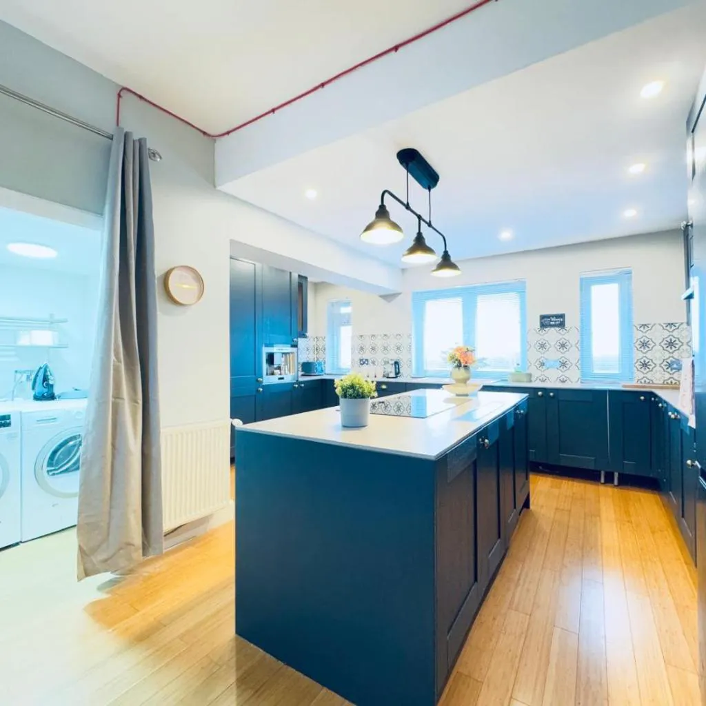 Photograph of Top Floor Apartment with Castle Views