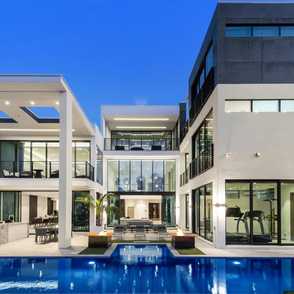 Photograph of Three Story Waterfront Villa with Basketball and Mini Golf