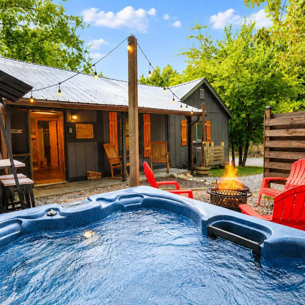 Photograph of Steps from Downtown Pigeon Forge Parkway + Private Hottub and firepit - Wifi - Firefly Bungalows