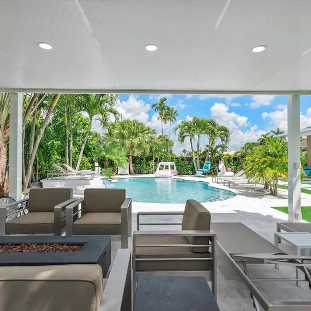 Photograph of VillaLee-Jungle Palm Island white marble pool Area