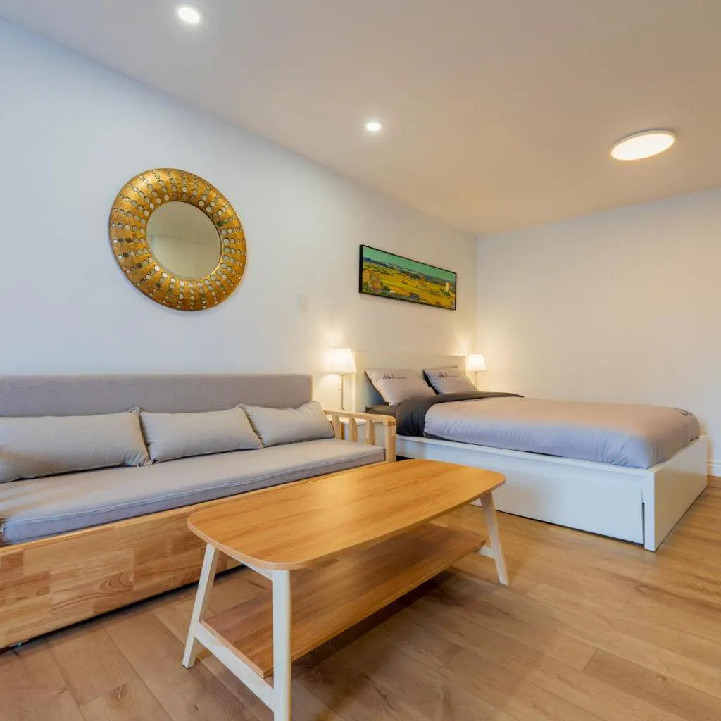 Photograph of New Renovated Studio Queen Bed Sofa Bed
