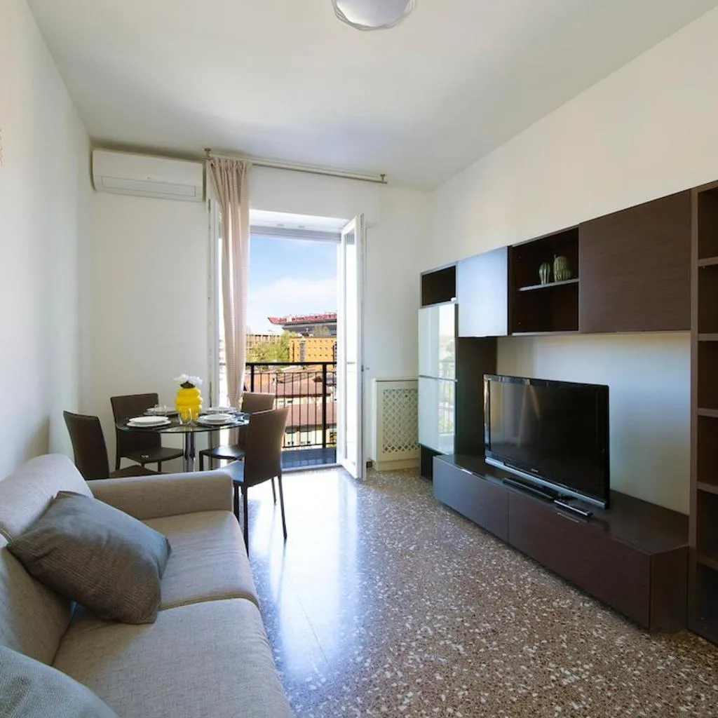 Photograph of Charming Two-Room Apartment with View of San Siro Stadium Upper Floor