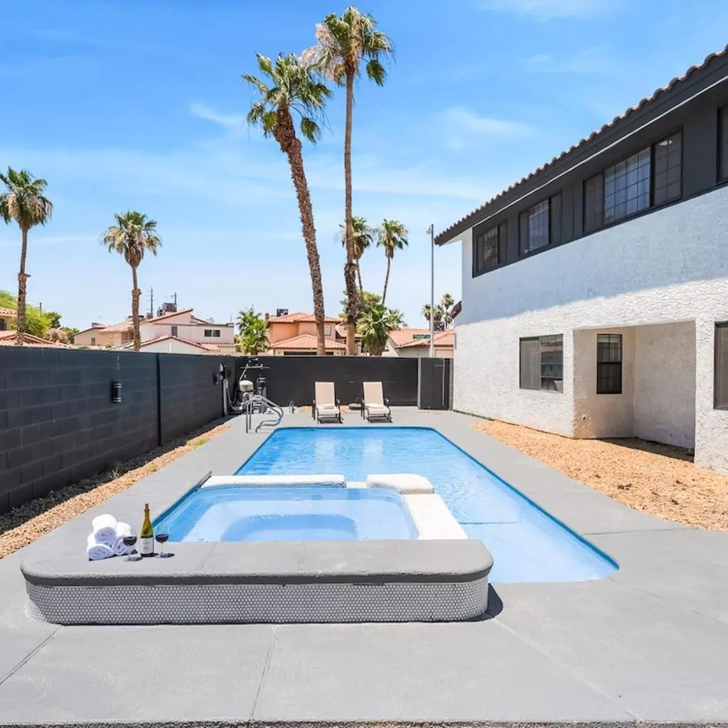Photograph of 4BR Oasis Dual Suites Pool Near Strip Games Parking