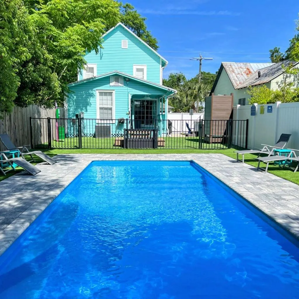 Photograph of Kid and Dog Haven Pool Side Fun in St Augustine