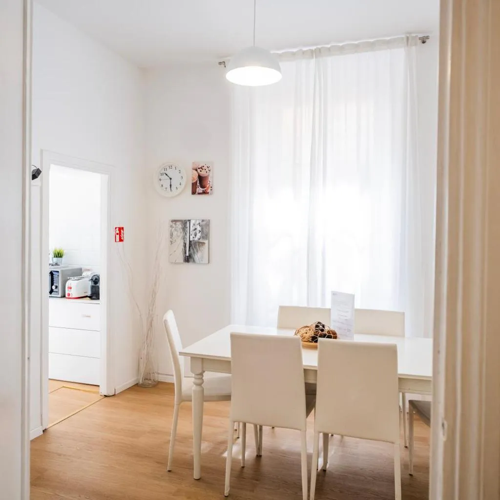 Photograph of Apartment by the Colosseum - White Chic Flats