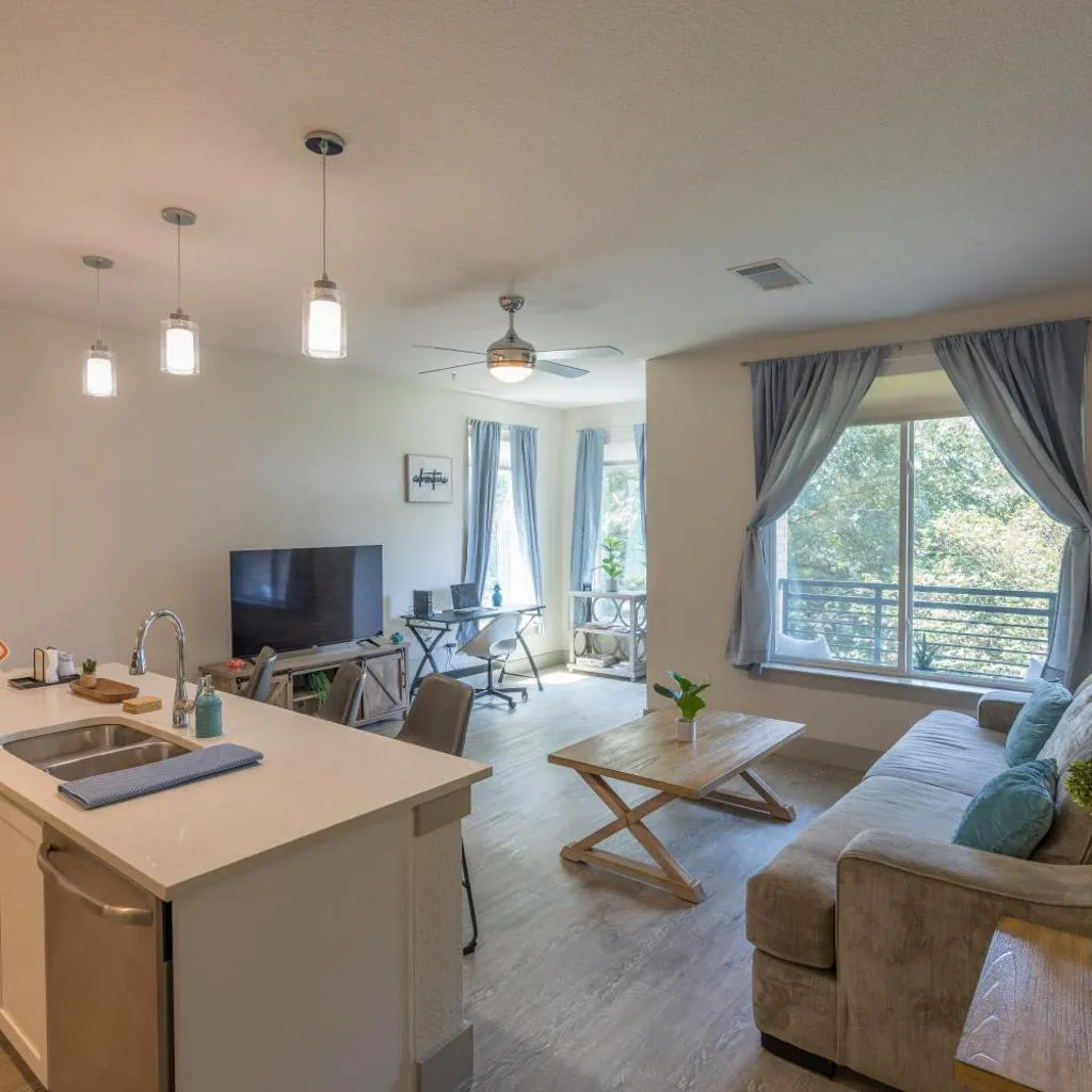Photograph of Riverwalk and Pool view Apt with King bed Infinity Pool Gym Free Parking