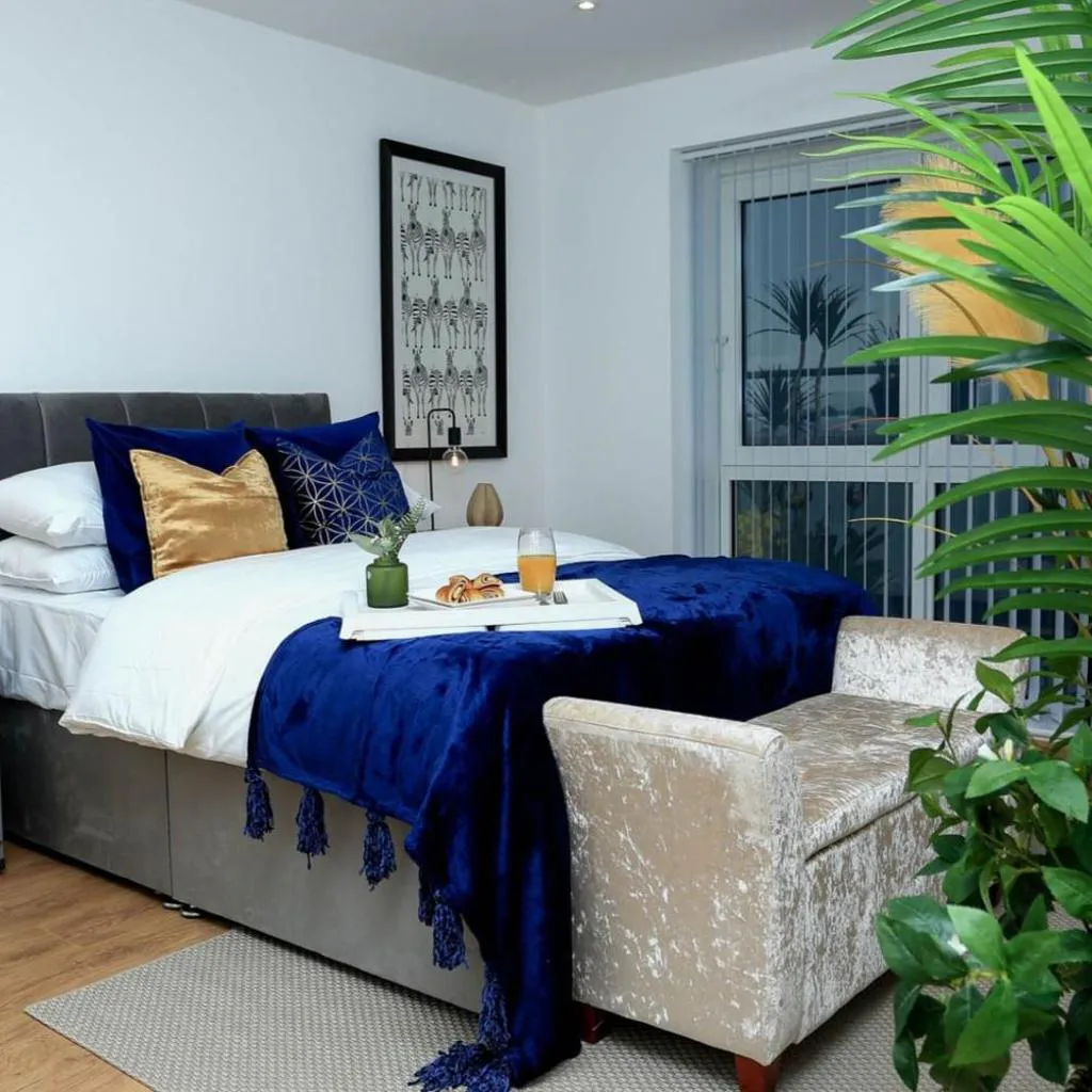 Photograph of Snuggle Inn - Riverside Apartments - Views Over looking London River Thames, Close to O2 Arena, London Excel, London City Airport, Thames Clipper- River Boat Service, Woolwich Ferry, Onsite parking, TWIN ROOM OPTION available