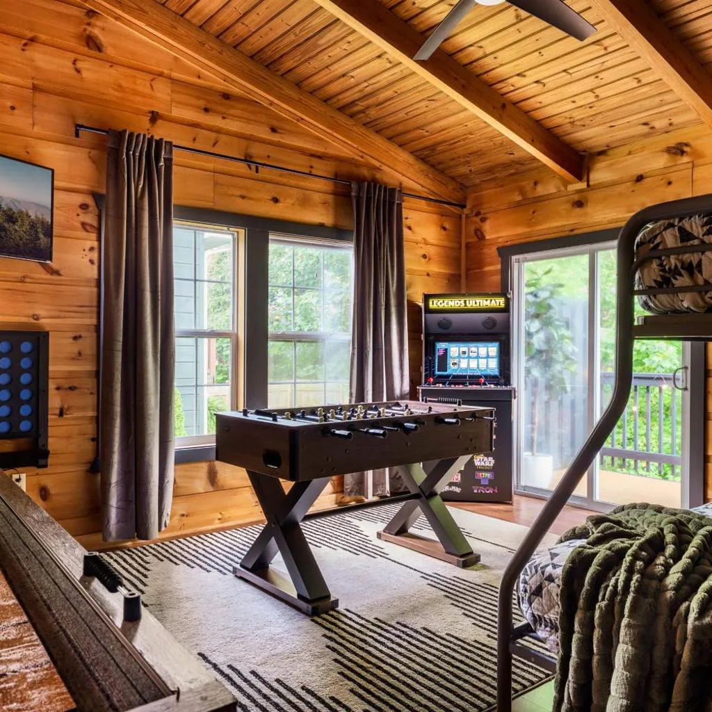 Photograph of The Copper Bird Mid Century Hot tub Arcade Gameroom Rock Climbing wall