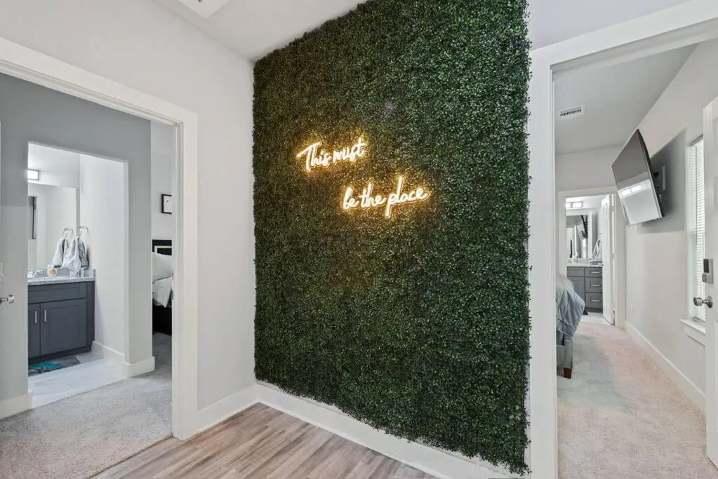 Photograph of Modern 2024 Townhome with Indoor Hoops Huge TVs and Gray Chic Design