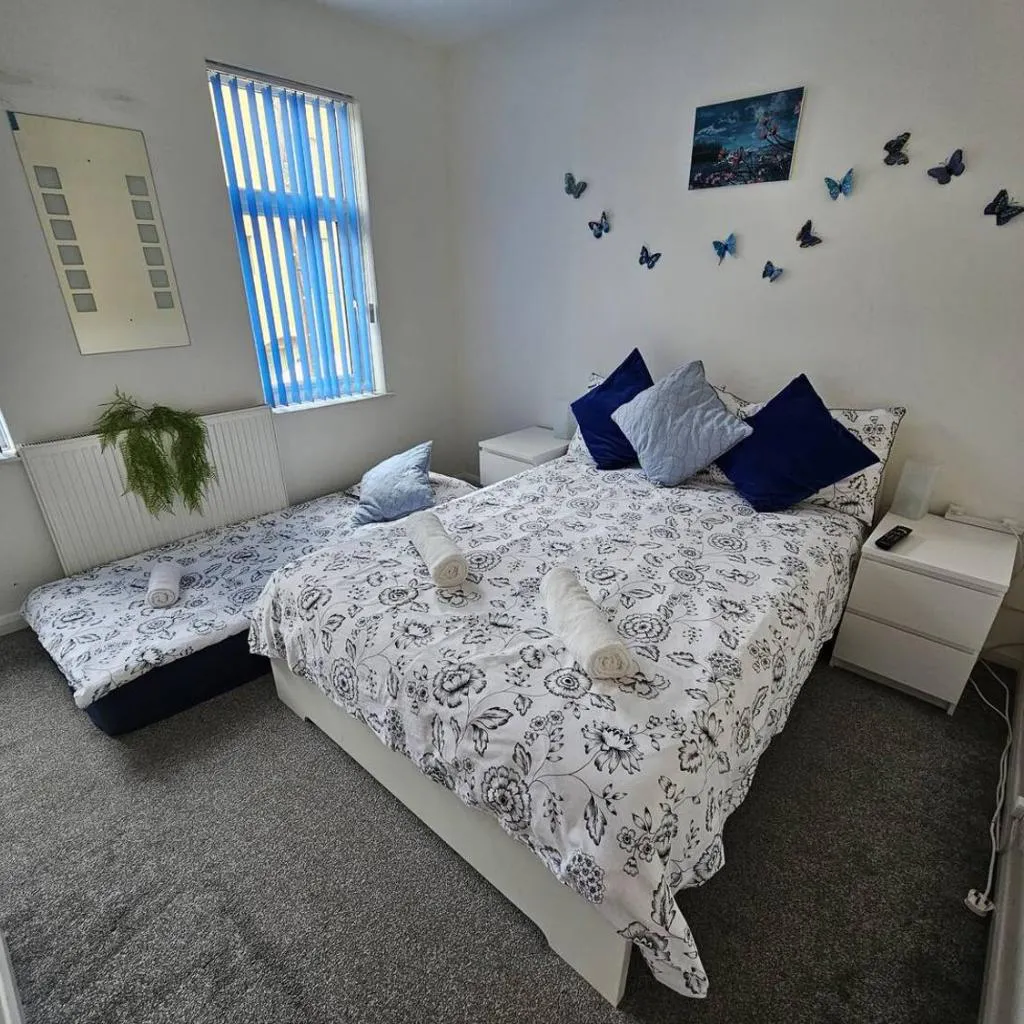 Photograph of Small Bedroom for 3 People, Friendly Cats in Common Areas