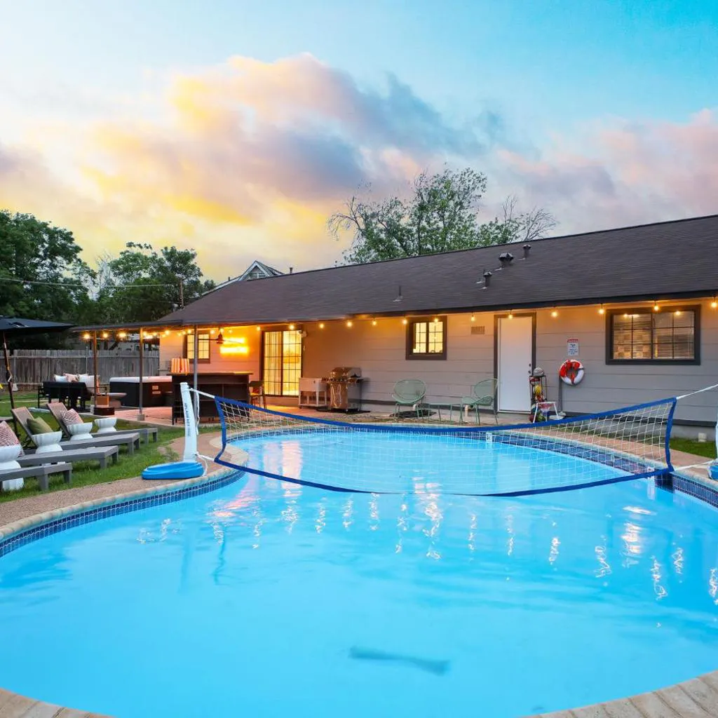 Photograph of Sleeps 10 Private Pool Hot Tub Fire Pit Playground