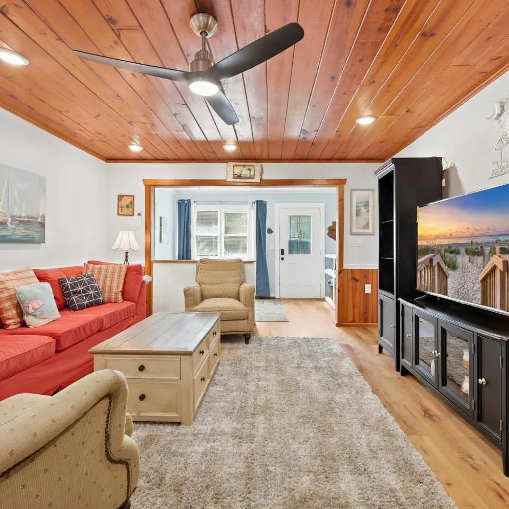 Photograph of Coco Cottage w Outdoor Bar and TV Walk to Beach