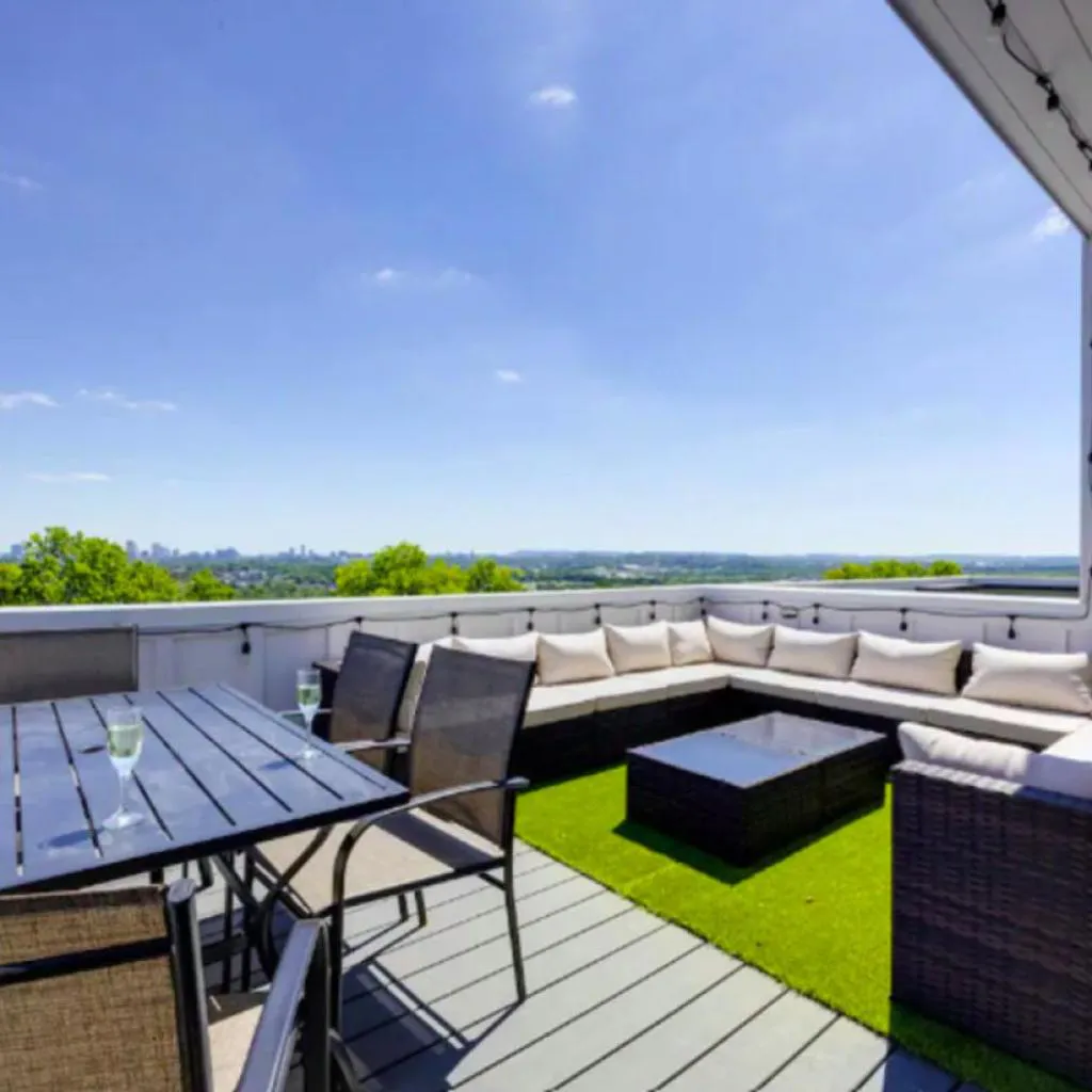 Photograph of Luxury four-story Home with Rooftop views, 10min to Downtown! Sleeps 12!