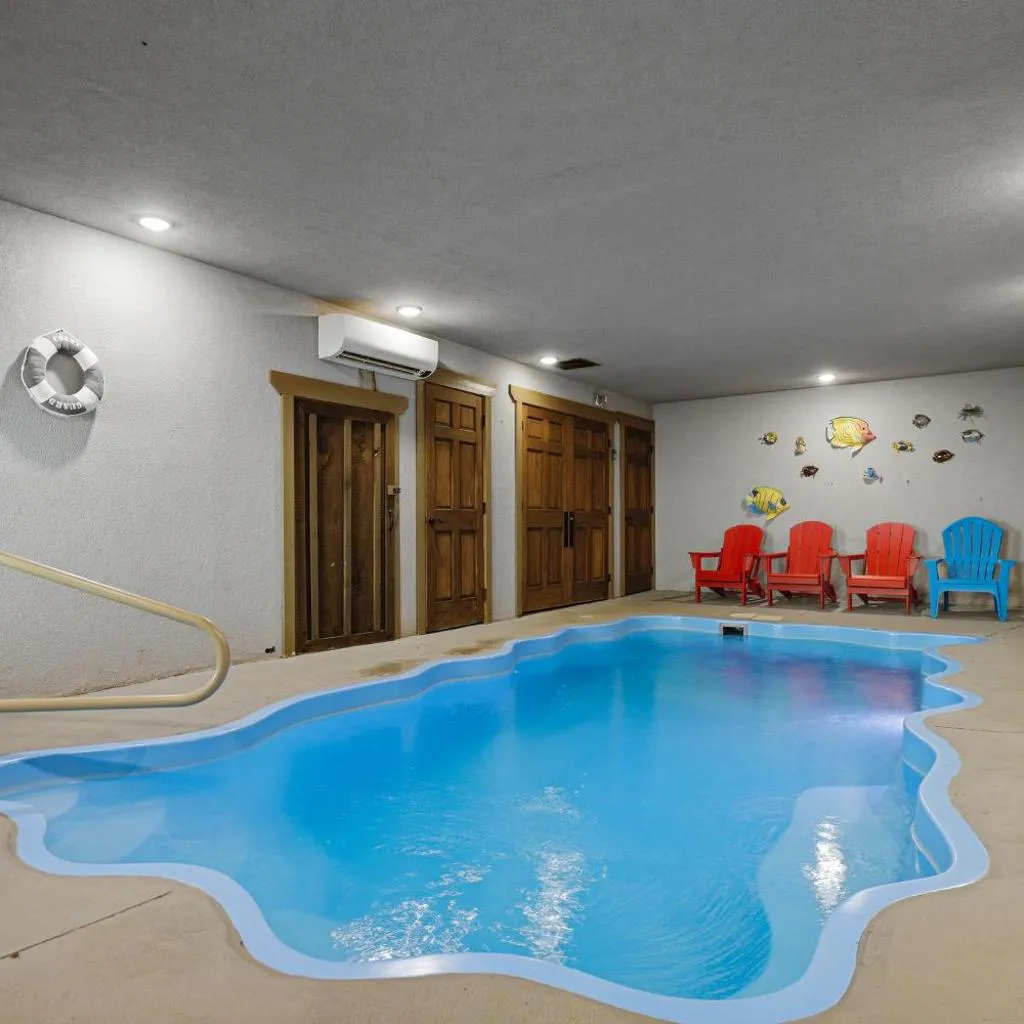 Photograph of Blue Lagoon Cinema – 4BR Chalet, Indoor Saltwater Pool, Sauna and Theater Room