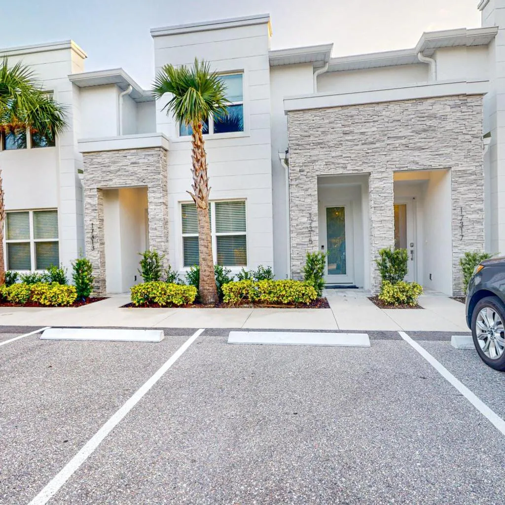 Photograph of Dog-friendly retreat with pool, covered patio, children's items, grill, & AC