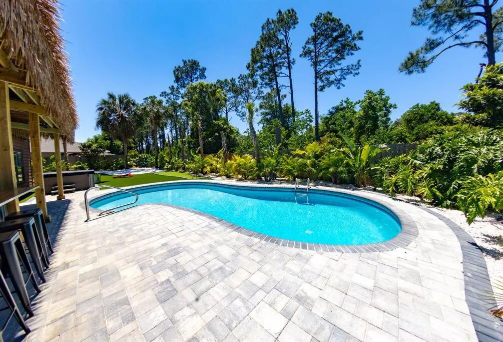 Photograph of Tropical Oasis, Tiki Bar, Pool, Mini Golf, Hot Tub
