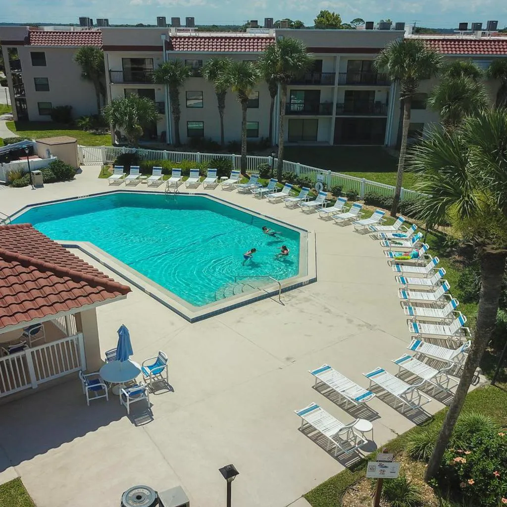 Photograph of Sun-kissed beach condo with amazing pool, tennis & patio - Steps to the beach!