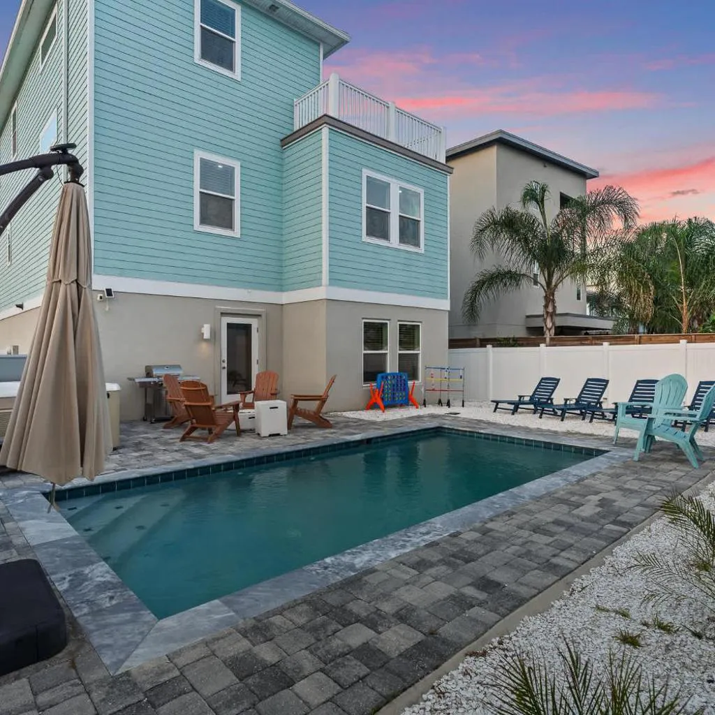 Photograph of The Salty Blue l Pool l Walk to Beach