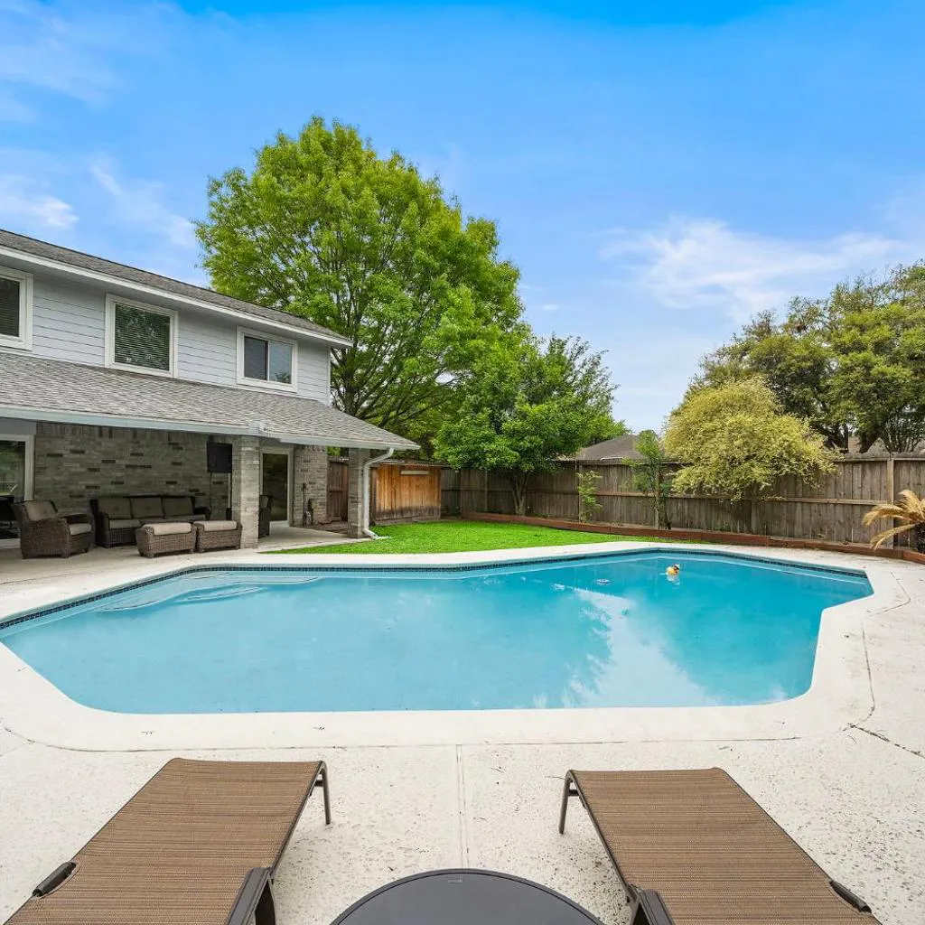 Photograph of Houston Pool Retreat WiFi Yard BBQ Games TVs