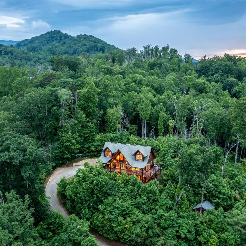 Photograph of Modern Cabin, 3 King Suites, Hot Tub, Bunk Room, Incredible Views, Game Room, Theatre, Great for Families and Friend Groups Alike, Unmatched Location 10 Mins to Parkway and Gatlinburg, 24 Hr Hospitality, Seasonal Fireplace, Dog Friendly
